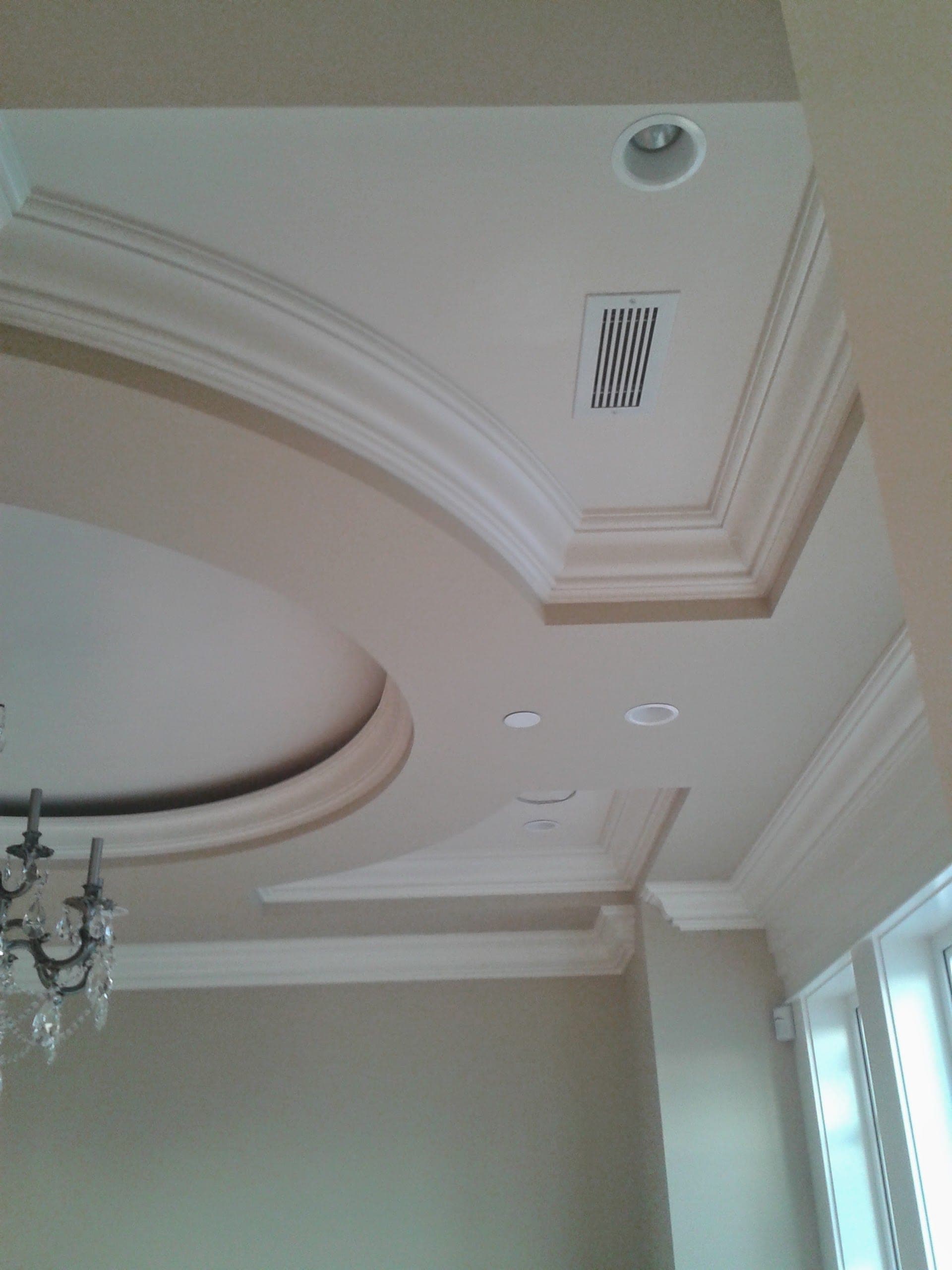 Custom ceiling medallion with ornate crown moulding